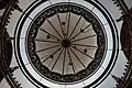 Looking up the dome through the circular chandelier