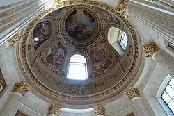 One of the four small side cupolas