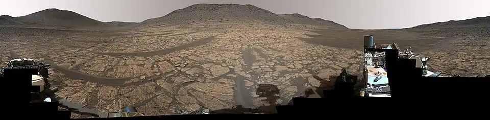 360-degree view of a region on Mars called "Bright Angel", where an ancient river flowed billions of years ago. Cheyava Falls is slightly right of center, about 361 feet (110 meters) from the rover.[8]