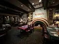 The original fireplace and dining room at El Cholo Spanish Cafe in 2024.