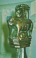 Elephant and castle carving of about 1475 on a modern chair made using medieval woodwork