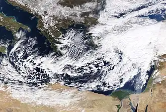 Elpis on January 25. Along with the cyclone, lake-effect snow squalls can also be seen to the north-end of the storm, in the Black and Aegean Seas