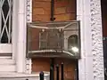 Plaque outside the embassy in Azerbaijani and English depicting the National emblem of Azerbaijan