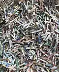 Shreds of euro banknotes (series ES2) with a typical size of 1.5 x 14 mm²