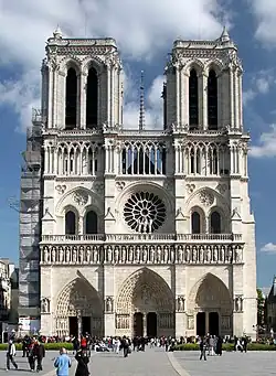 Notre Dame de Paris, has a Gothic west front in which verticals and horizontals are balanced.