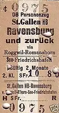 Railway passenger ticket punched multiple times, with at least 4 different die shapes: triangle, oval, and two sizes of tear drop