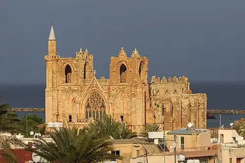 Image 22Cathedral of Saint Nicholas, consecrated in 1328, the largest medieval building in Famagusta, where the Kings of Cyprus were crowned also as Kings of Jerusalem. In 1571 having fallen to the Ottoman Empire it became the Mosque of Mağusa, and remains a mosque today (from History of Cyprus)