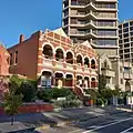 Terrace-pair, East Melbourne (c. 1908). Grainger, Kennedy & Little, architects.[181]