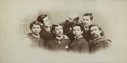 The four Filipino Ilustrados in front of the three peninsula Spaniard artists are; (left to right) Juan Luna, Pedro Paterno, Félix Hidalgo and Miguel Zaragoza