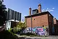 The Atherton Estate towers over nearby heritage buildings in Fitzroy.