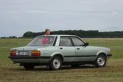 Ford Taunus TC3 4-door, highlighting the enlarged rear lights