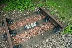 Former High Royds Hospital Railway trackbed with commemorative section of track