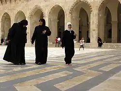 Visitors in courtyard