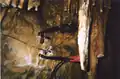 The organ manuals control solenoids that strike each stalactite with a rubber mallet