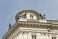Statues of griffins on the roof.