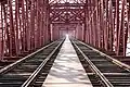 Image 20Hardinge Bridge is a steel railway bridge over the river Padma located at Paksey, Ishwardi, Pabna in western Bangladesh. It is named after Lord Hardinge, who was the Viceroy of India from 1910 to 1916. The bridge is 1.8 kilometres (1.1 mi) long. Photo Credit: Azim Khan Ronnie