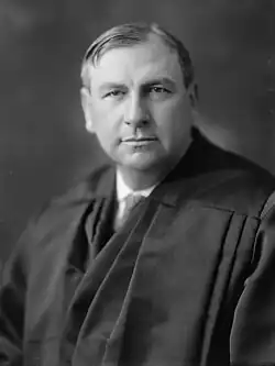 Black-and-white head shot of Stone