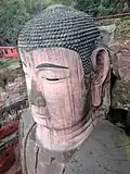 Detailed close-up shot of the statue's face.