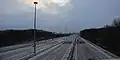 Newly opened in 2022, collector-express system in Mississauga viewed from the pedestrian bridge that replaced the original road bridge carrying Second Line West.