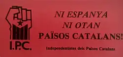 A sign with this organization's name on it. There is an illustration of a raised fist beside it.