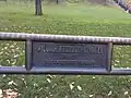The commemorative plaque on the bench.