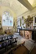 The window in the front wall, and the monument to Jane on the right wall.