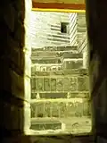 Internal spiral staircase seen through window from outside