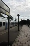 Platform at Järna with an X60 train