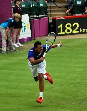 Tsonga hitting a running forehand return