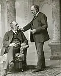 Wolfenstein's "look-alike" of his boss John Jaeger sitting and standing