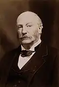 Black-and-white photographic portrait of John William Strutt
