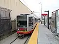 K Ingleside train leaving the platform at Balboa Park station, 2018