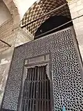 Wooden screen at the entrance of the southern mausoleum