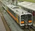 KiHa E120 and 110 at Sakamachi Station, July 2009
