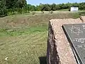 Killing site with memorial stone