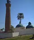 The domes and minaret of the Prophet Daniel Mosque