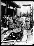Khai Dinh in palanquin