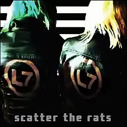 Two women with leather jackets photographed from behind