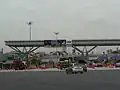Petaling Jaya toll plaza of trip from Puchong to Petaling Jaya. The modern design is LDP standard design of toll plazas with electronic toll collection of cash lanes and Touch 'n Go lanes seen here. The SmartTAG lanes immediately next to Touch n Go lanes.