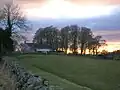 Leahill Farm and the fosse, looking West.
