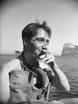IWM photo of Lt. Lionel 'Buster' Crabb, RNVR, Officer in Charge of the Underwater Working Party at Gibraltar, dated April 1944