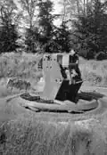 A Belgian M1891 turret at Fort Loncin. An explosion in the ammunition bunker threw the turret into the air and it landed upside down in its own pit largely intact.