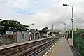 A broad view of the platforms and footbridge.
