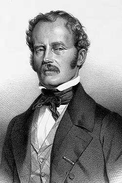 Black-and-white lithograph of a man in early middle age, in formal dress and with a neat moustache.
