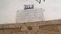 Marble epigraphy at the entrance of the madrasa