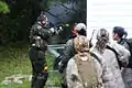MARSOC wives participate in a simulated raid during Jane Wayne Day