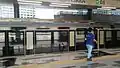 An MRT train stopping at Mutiara Damansara MRT station.