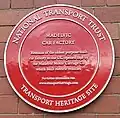 A commemorative plaque marking the motor works.