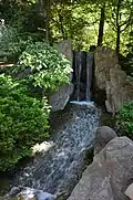 Waterfall along a trail.