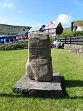 Memorial in memory of the writer Martin Joensen who was born in Sandvík in 1902.